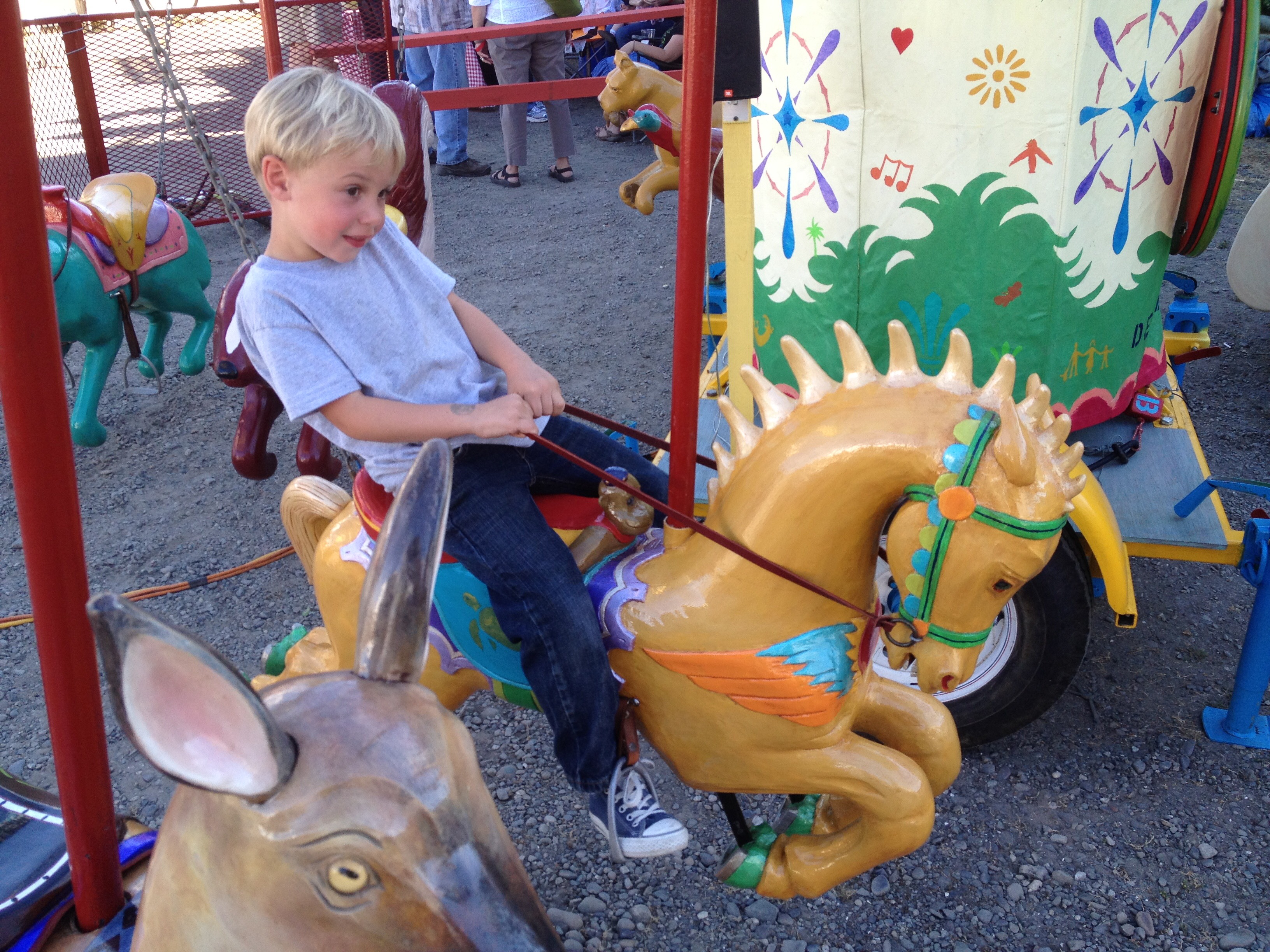 Carousel With Rider Fifteen Rider Portable Swing Carousel | AntiqueCarousels.com